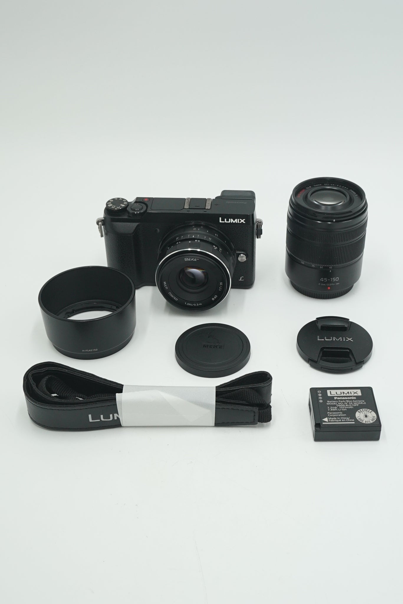 Panasonic DMCG85/06701 DMC-G85 Digital Camera + Meke 35mm f/1.7 + Lumix 45-150mm Lens, Used