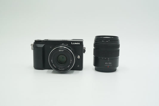Panasonic DMCG85/06701 DMC-G85 Digital Camera + Meke 35mm f/1.7 + Lumix 45-150mm Lens, Used